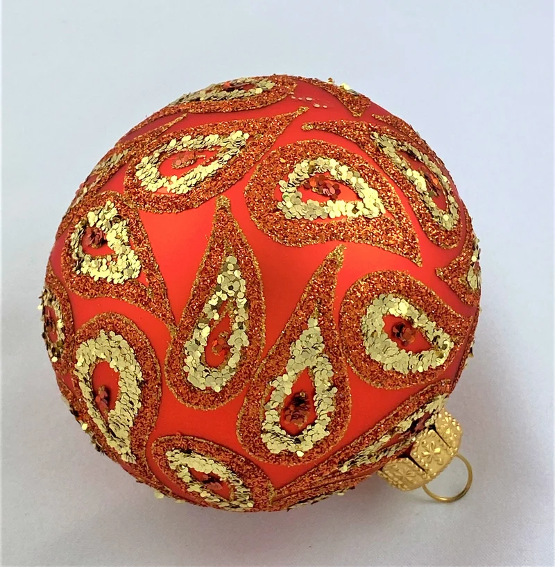 Kugel warmes Rot mit Paisley-Muster