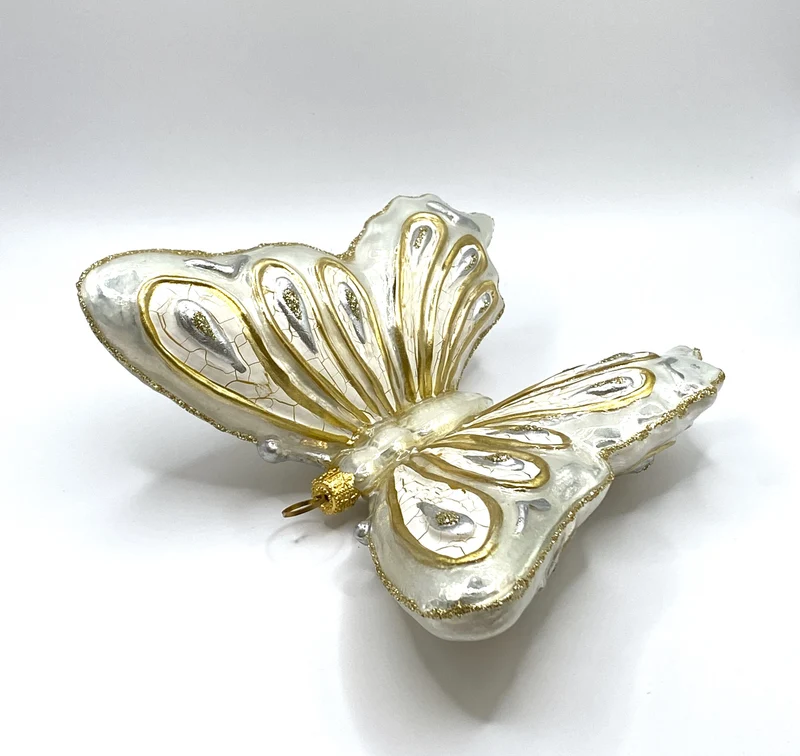 Grosser weiss/goldener Schmetterling