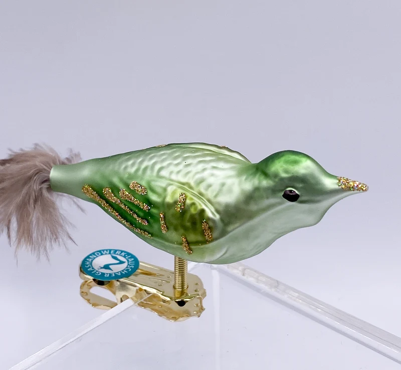 Olivgrüner Vogel