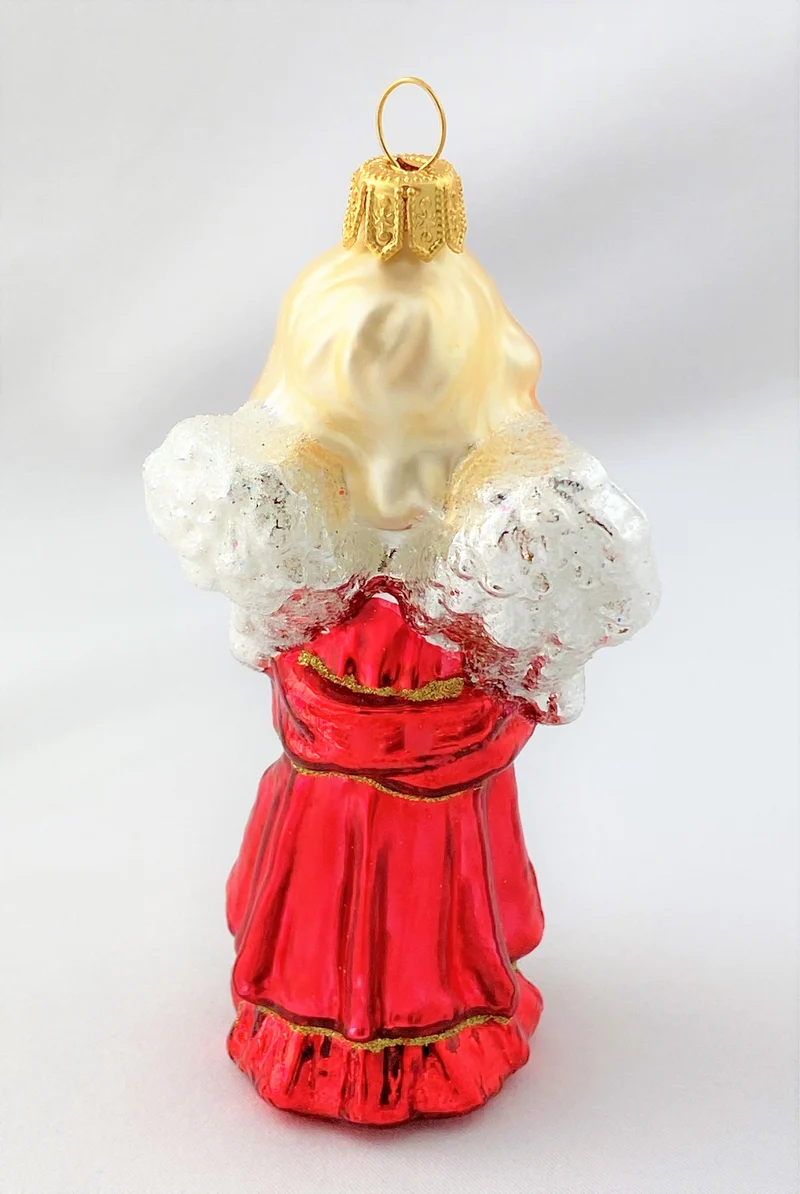 Engel mit Stern im roten Kleid
