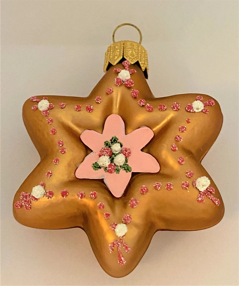 Gingerbread Lebkuchenstern mit rosa Sternendekoration