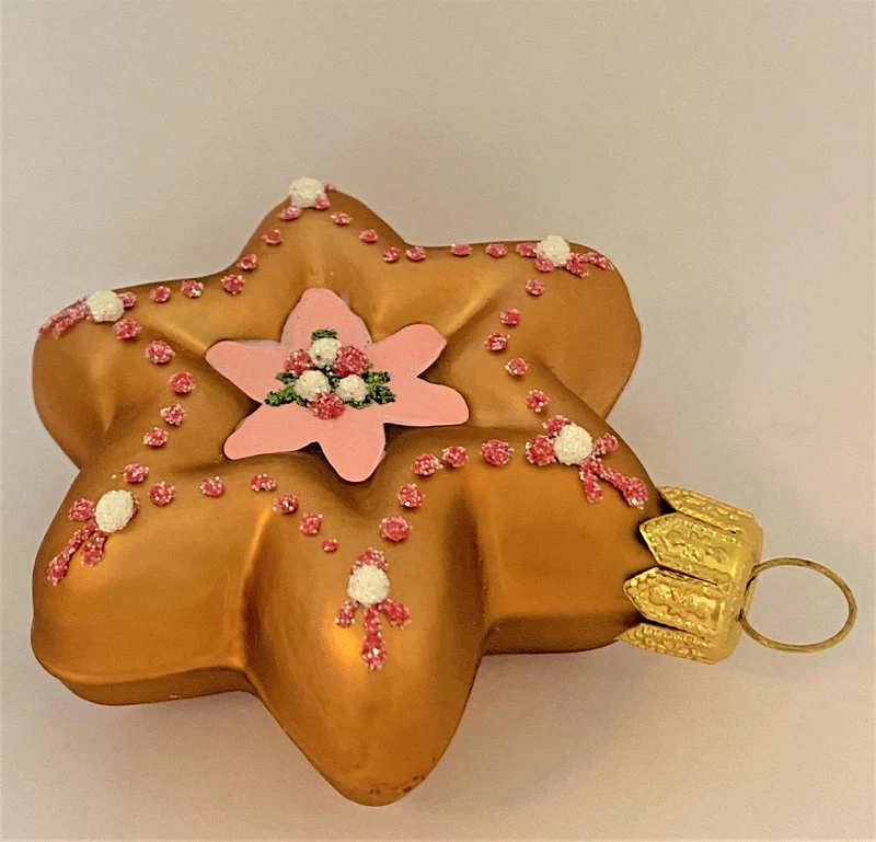 Gingerbread Lebkuchenstern mit rosa Sternendekoration