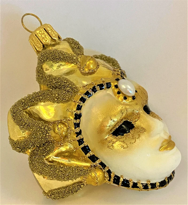 Venezianische Maske mit goldenen Glöckchen