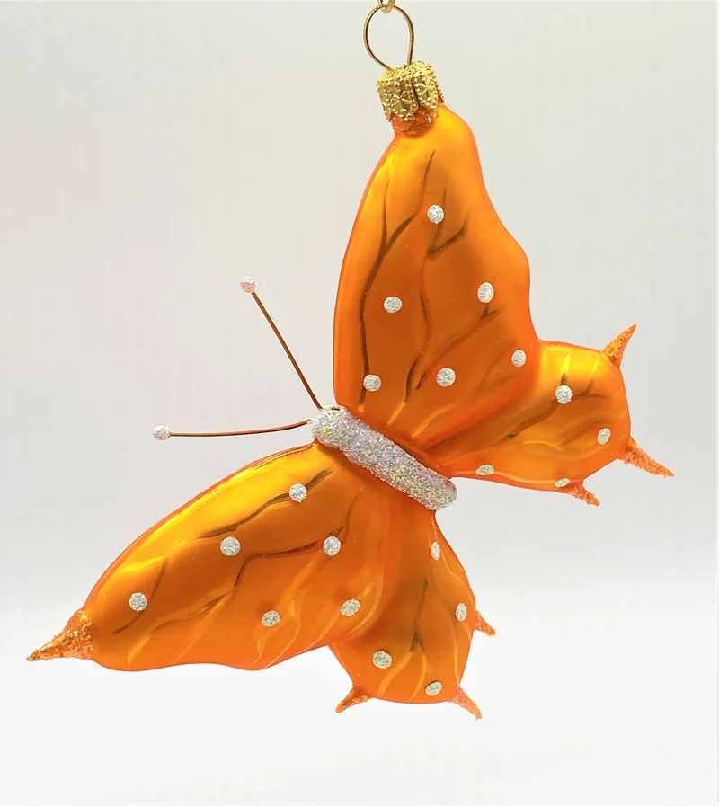 Schmetterling orange, weisse Tupfen