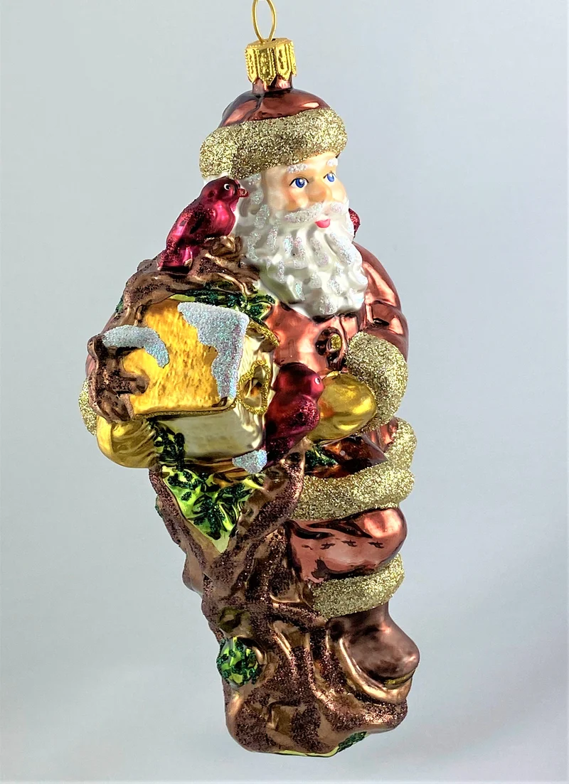 Weihnachtsmann mit Vogelhäuschen