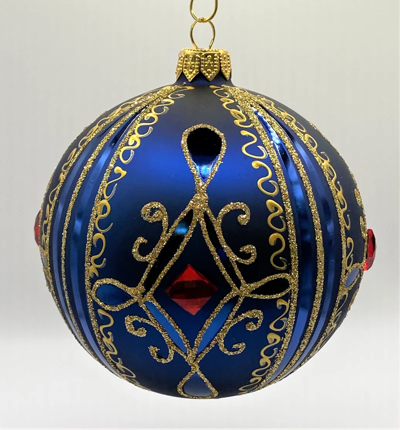 Kugel blau matt mit Golddekor, grosse rote Steine