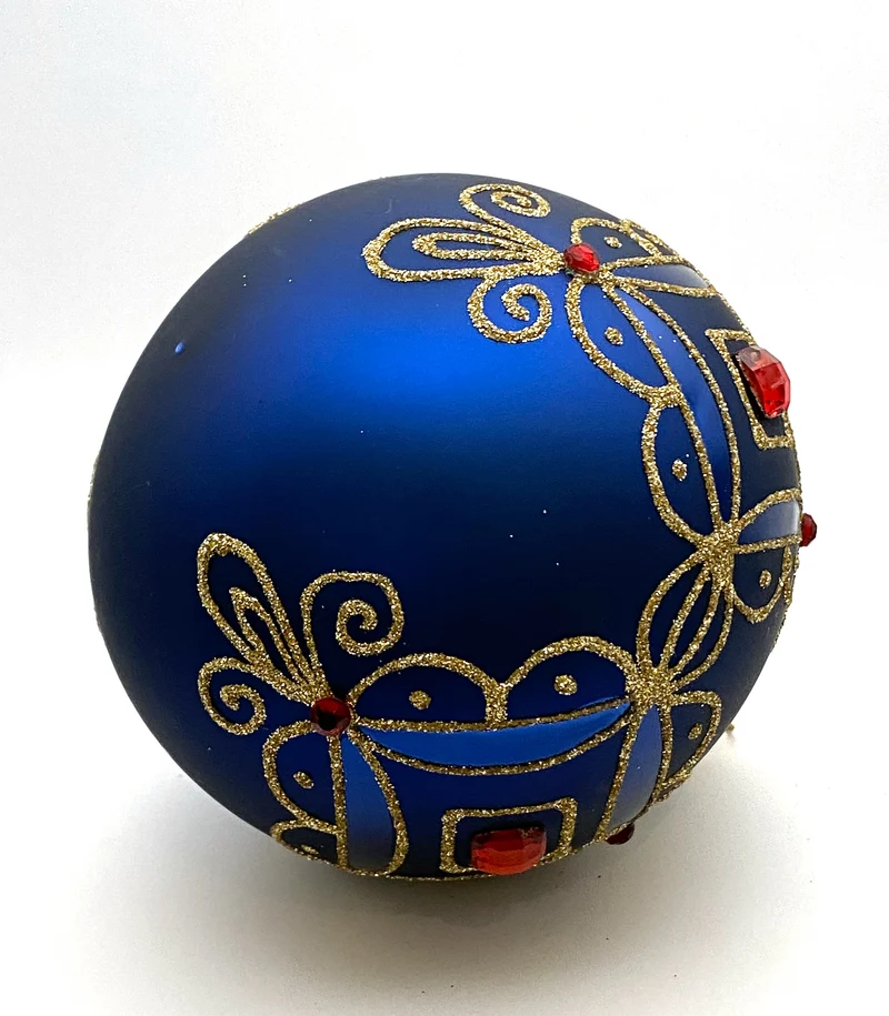 Kugel blau matt mit Golddekor, kleine und grosse rote Steine