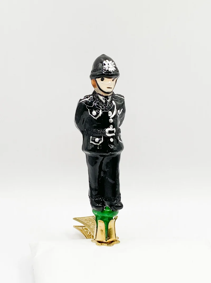 Englischer Polizist, Bobby, auf Clip, England