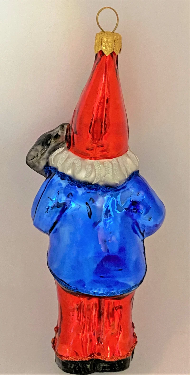 Fröhlicher Zwerg spielt Laute, blaue Jacke