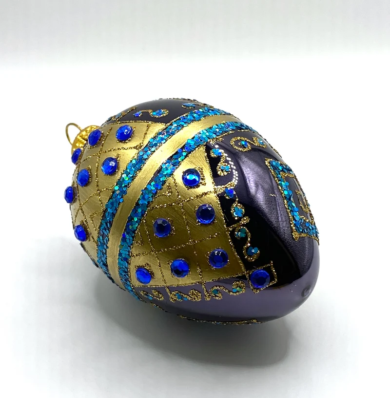 Ei-Form dunkelblau mit Gold-Dekor