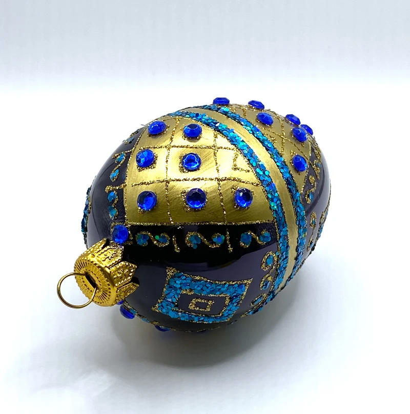 Ei-Form dunkelblau mit Gold-Dekor