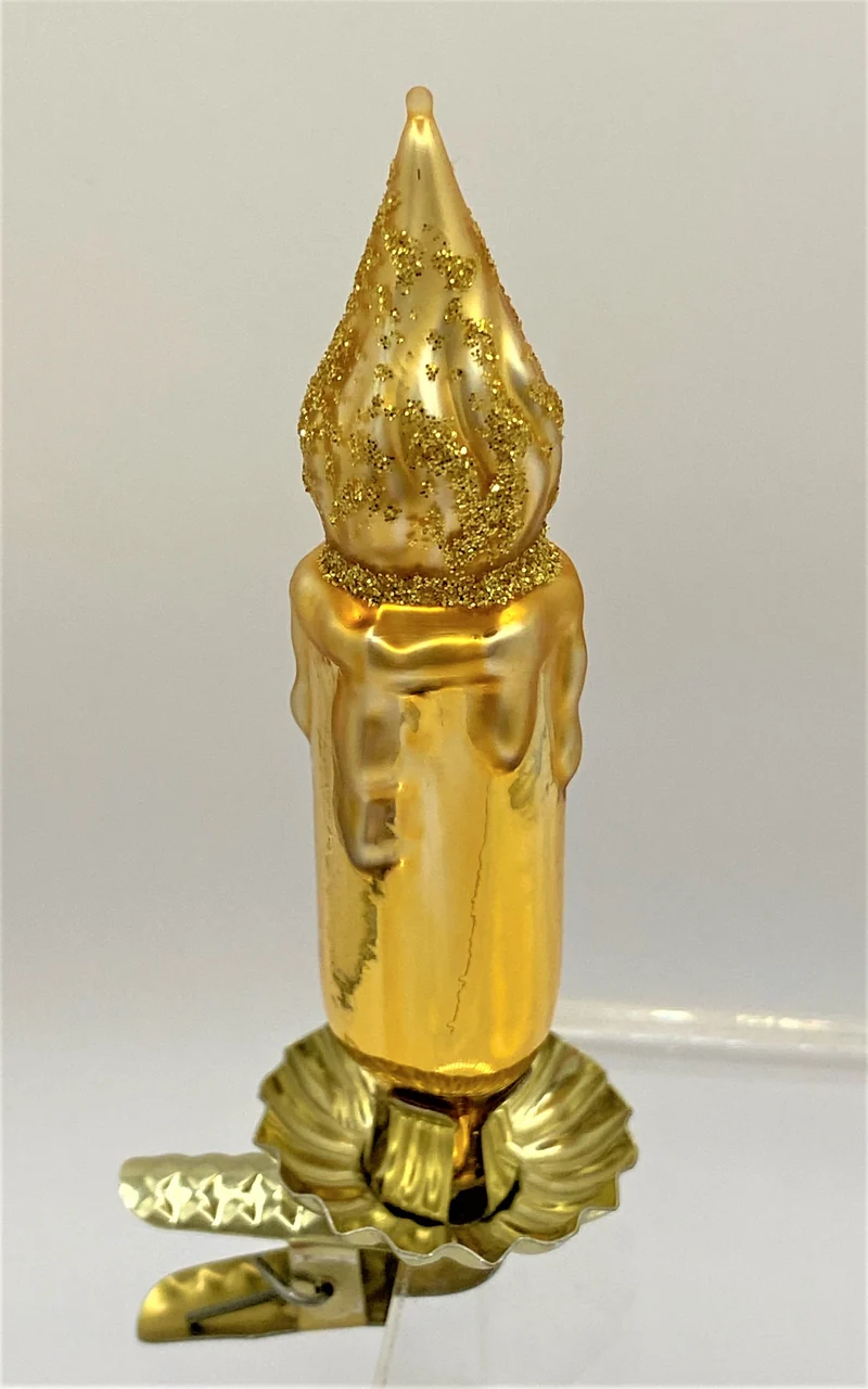 Goldene Kerze auf Clip