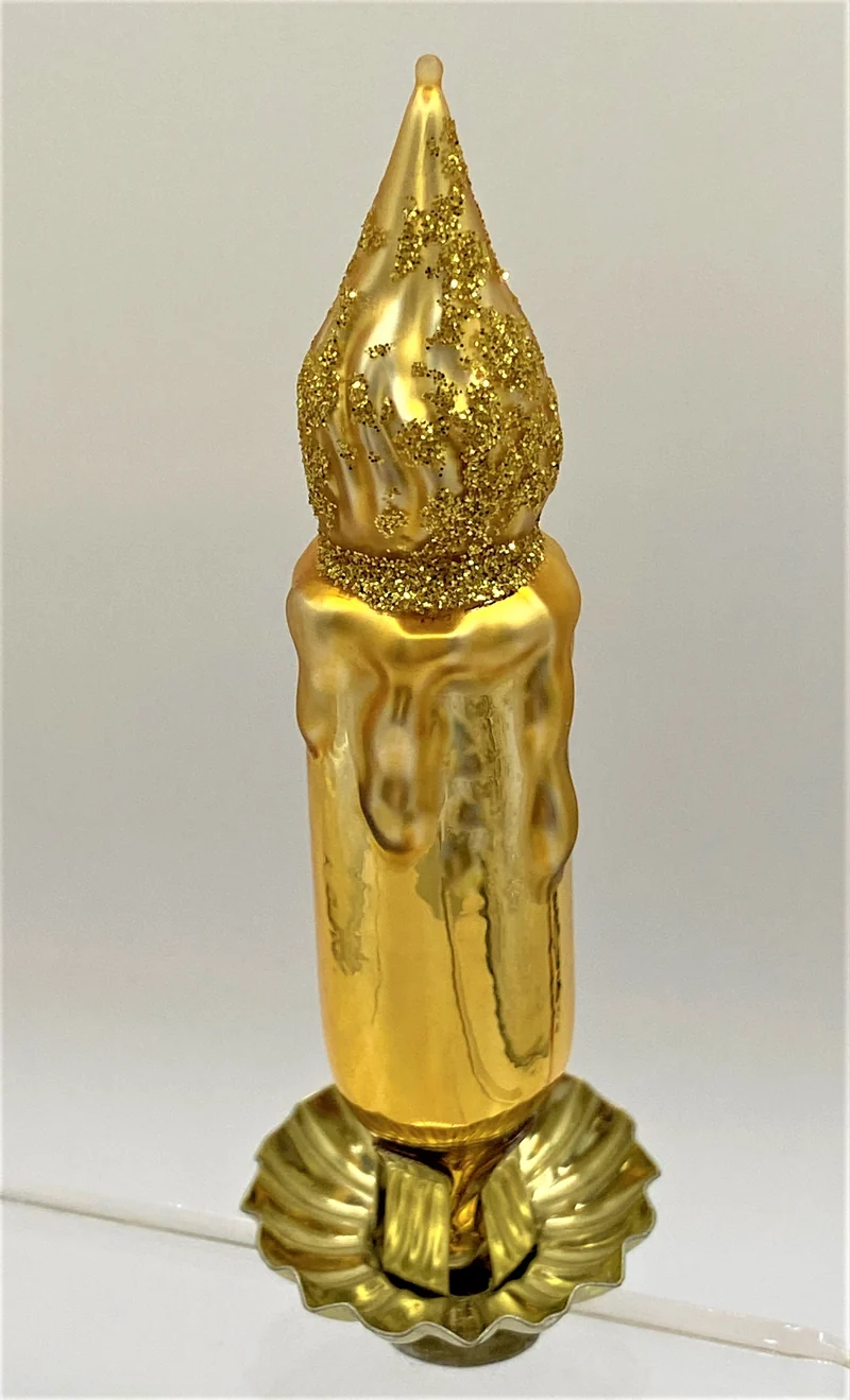Goldene Kerze auf Clip