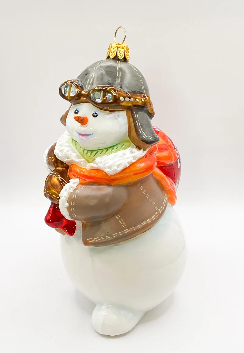 Schneemann mit Piloten-Mütze, KOMOZJA MOSTOWSKI