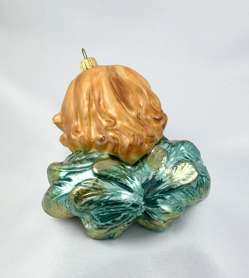 Putto mit grüngoldenen Flügeln, KOMOZJA MOSTOWSKI
