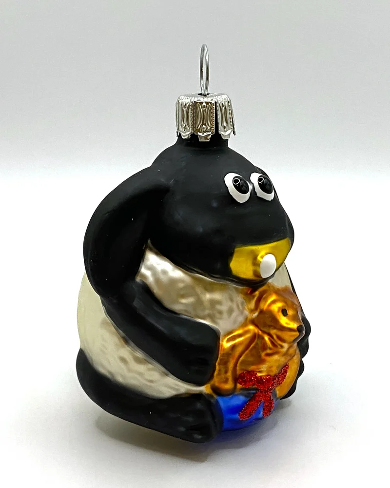 Timmy mit Geschenk, Shaun das Schaf