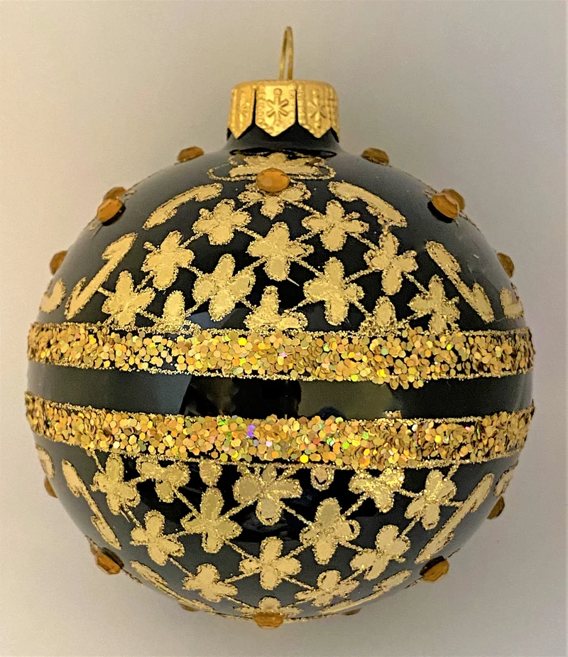 Kugel schwarz mit Golddekor mit Schmucksteinen