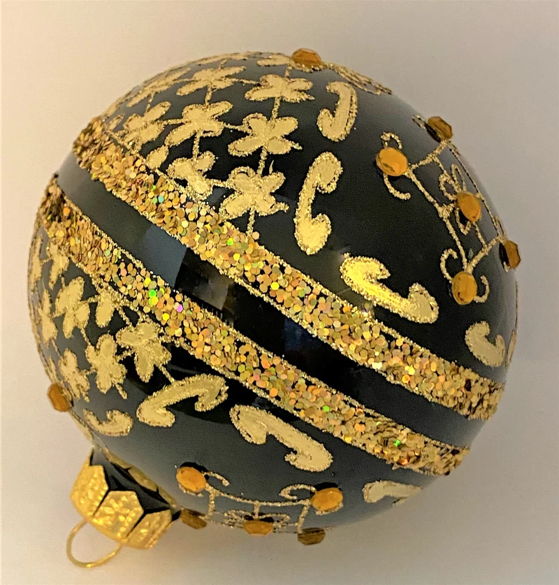Kugel schwarz mit Golddekor mit Schmucksteinen
