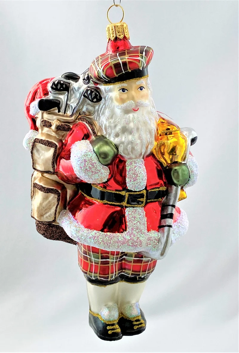 Der Weihnachtsmann erfreut sich am Golf spielen