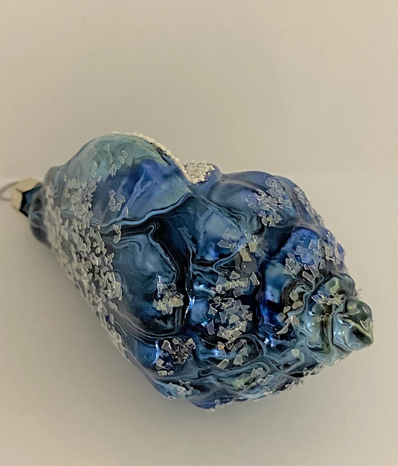 Blaue Meeresschnecke mit Glitzer