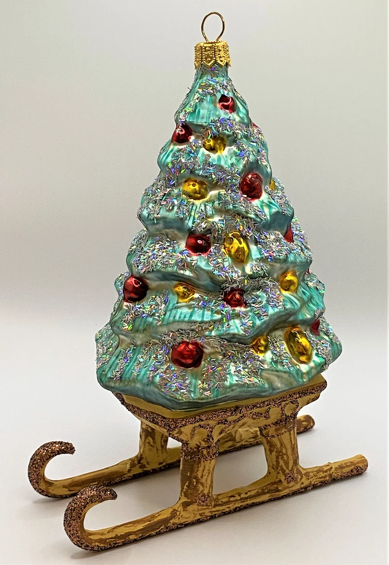 Christbaum auf Schlitten mit Glitzer