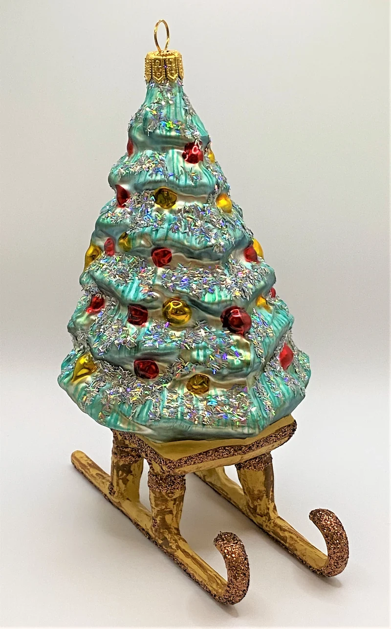 Christbaum auf Schlitten mit Glitzer