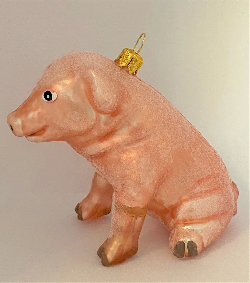 Sitzendes Schweinchen