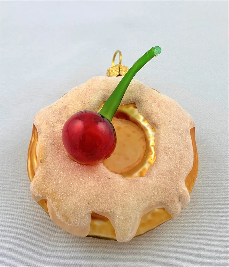Donut mit Kirsche