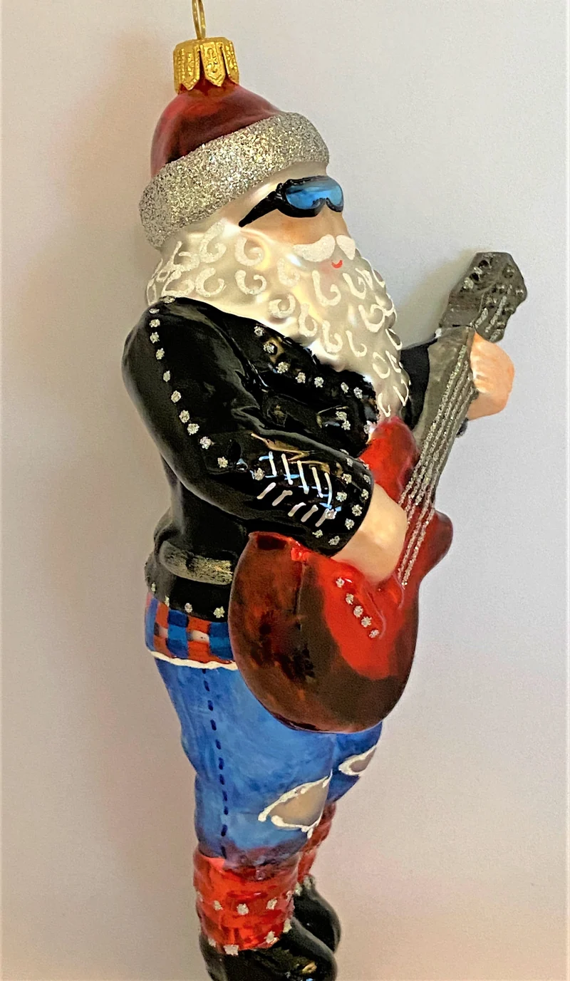 Santa Claus spielt die elektrische Gitarre