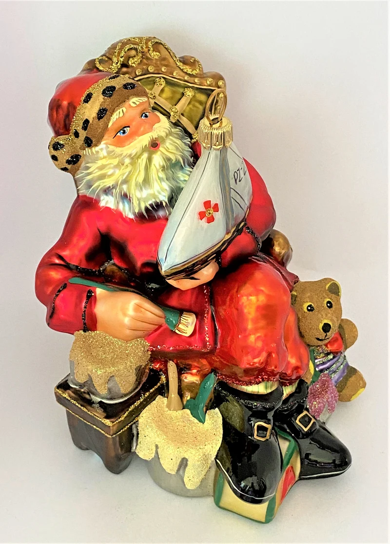 Der Weihnachtsmann bemalt ein Segelboot, KOMOZJA MOSTOWSKI