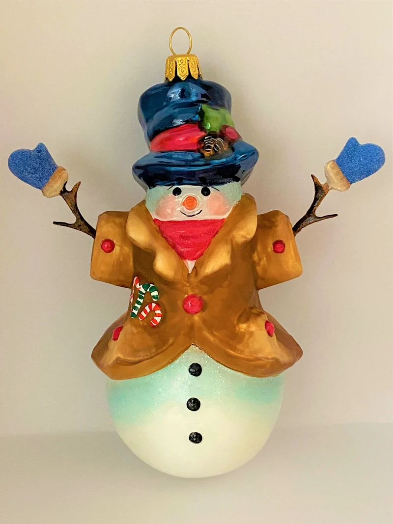 Schneemann mit blauen Handschuhen, KOMOZJA MOSTOWSKI