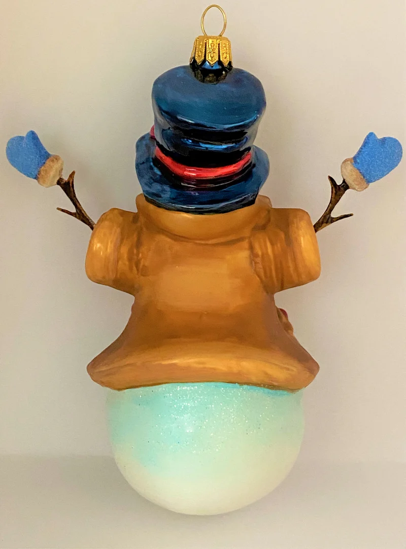 Schneemann mit blauen Handschuhen, KOMOZJA MOSTOWSKI