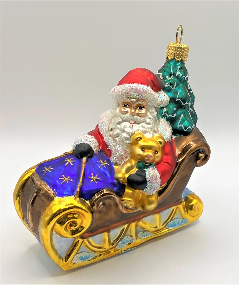 Weihnachtsmann bringt den Christbaum mit dem Schlitten, Sternchendecke