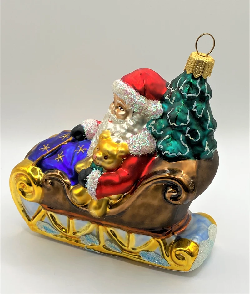 Weihnachtsmann bringt den Christbaum mit dem Schlitten, Sternchendecke
