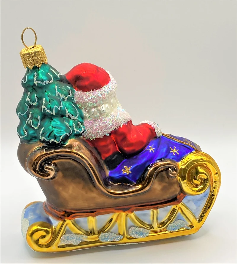 Weihnachtsmann bringt den Christbaum mit dem Schlitten, Sternchendecke