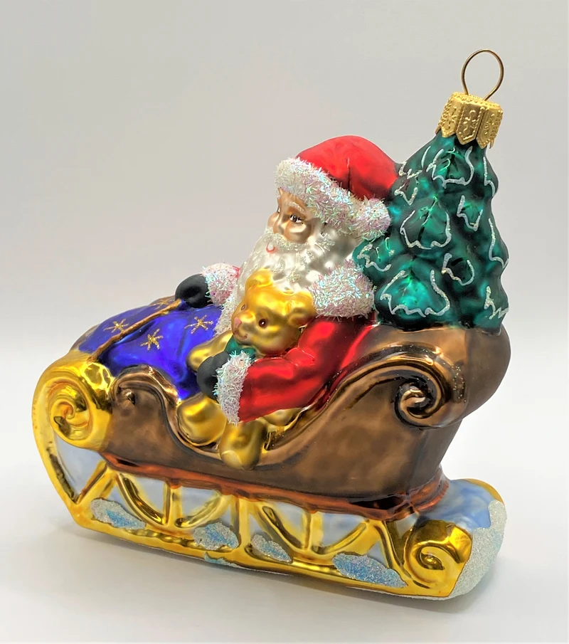 Weihnachtsmann bringt den Christbaum mit dem Schlitten, Sternchendecke