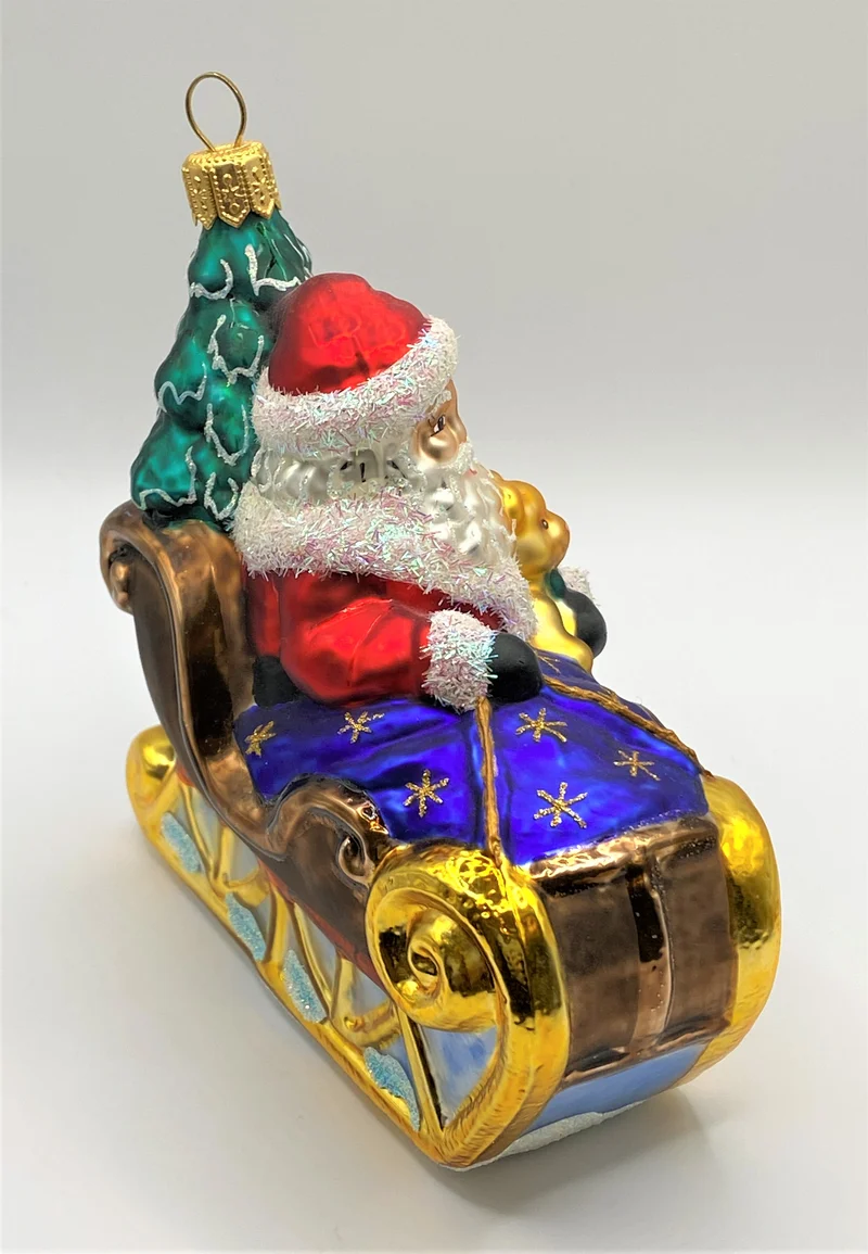 Weihnachtsmann bringt den Christbaum mit dem Schlitten, Sternchendecke