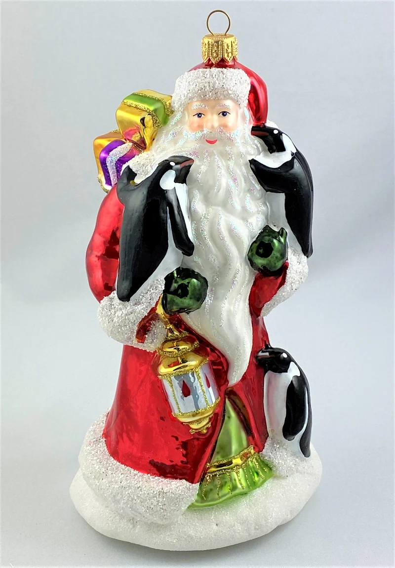 Weihnachtsmann bringt den Pinguinen die Weihnachtsgeschenke