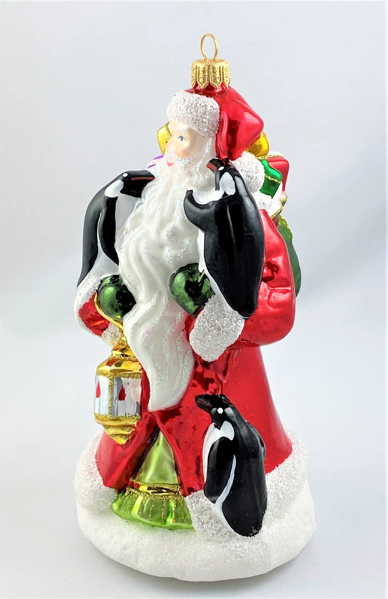 Weihnachtsmann bringt den Pinguinen die Weihnachtsgeschenke