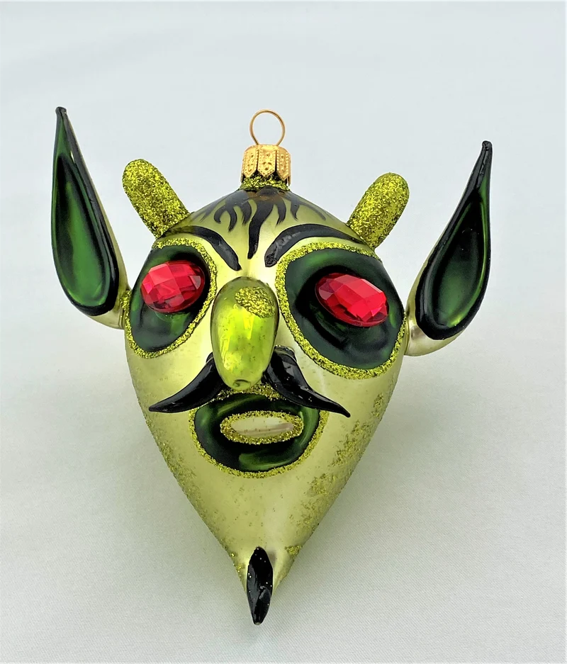 Grüner Teufel mit roten Augen