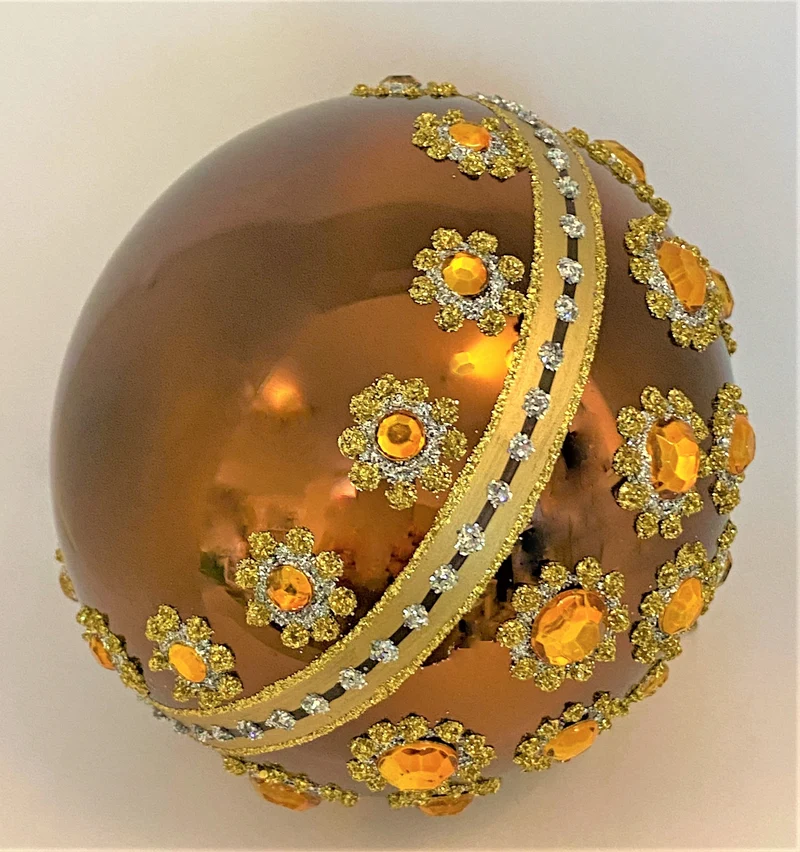 Kupfer Kugel mit goldenen Steinen