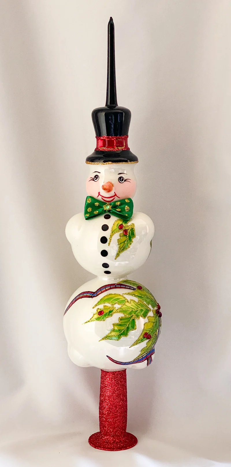Spitze mit Schneemann und Ilex Dekor