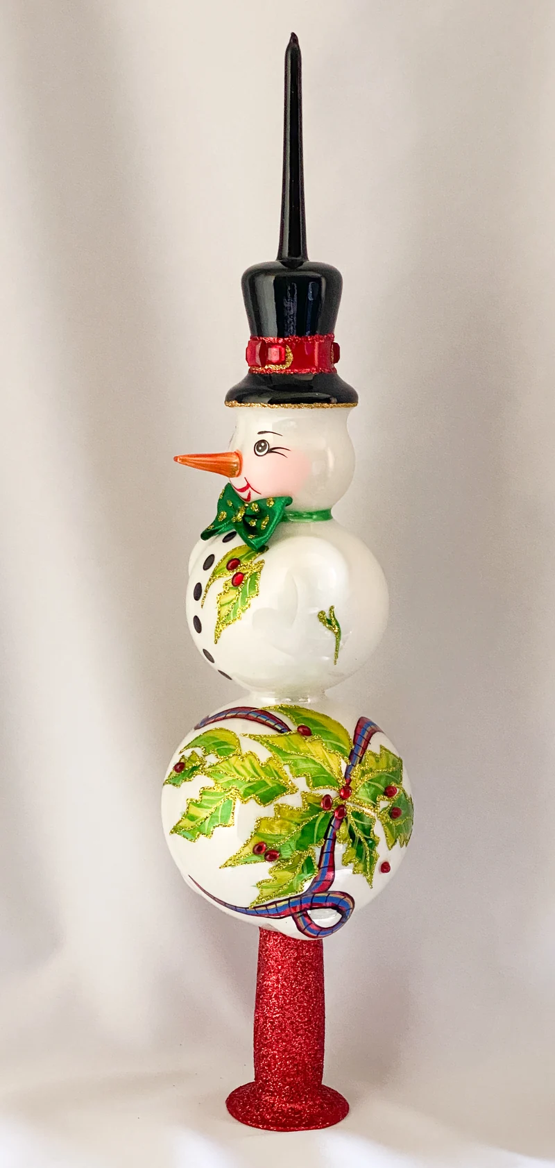 Spitze mit Schneemann und Ilex Dekor