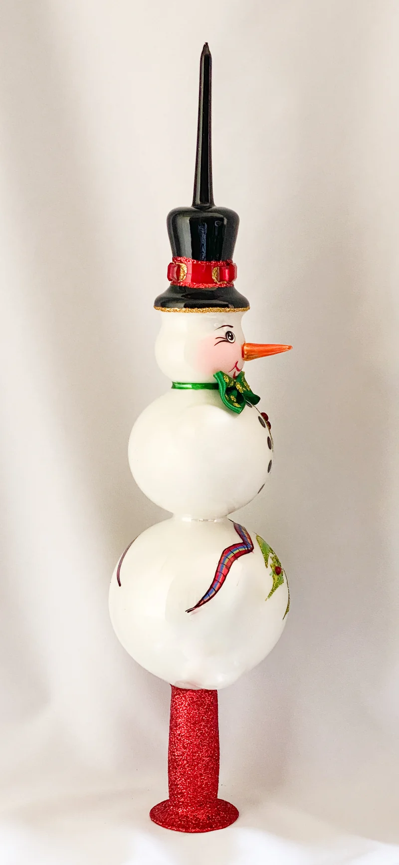 Spitze mit Schneemann und Ilex Dekor