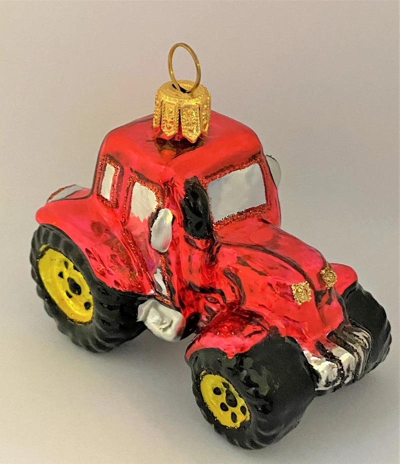Roter Traktor mit gelben Rädern