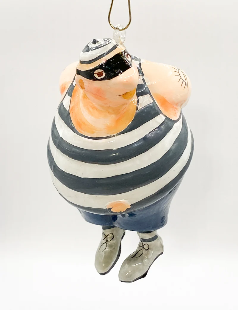 Der nette Dieb Karikatur, KOMOZJA MOSTOWSKI