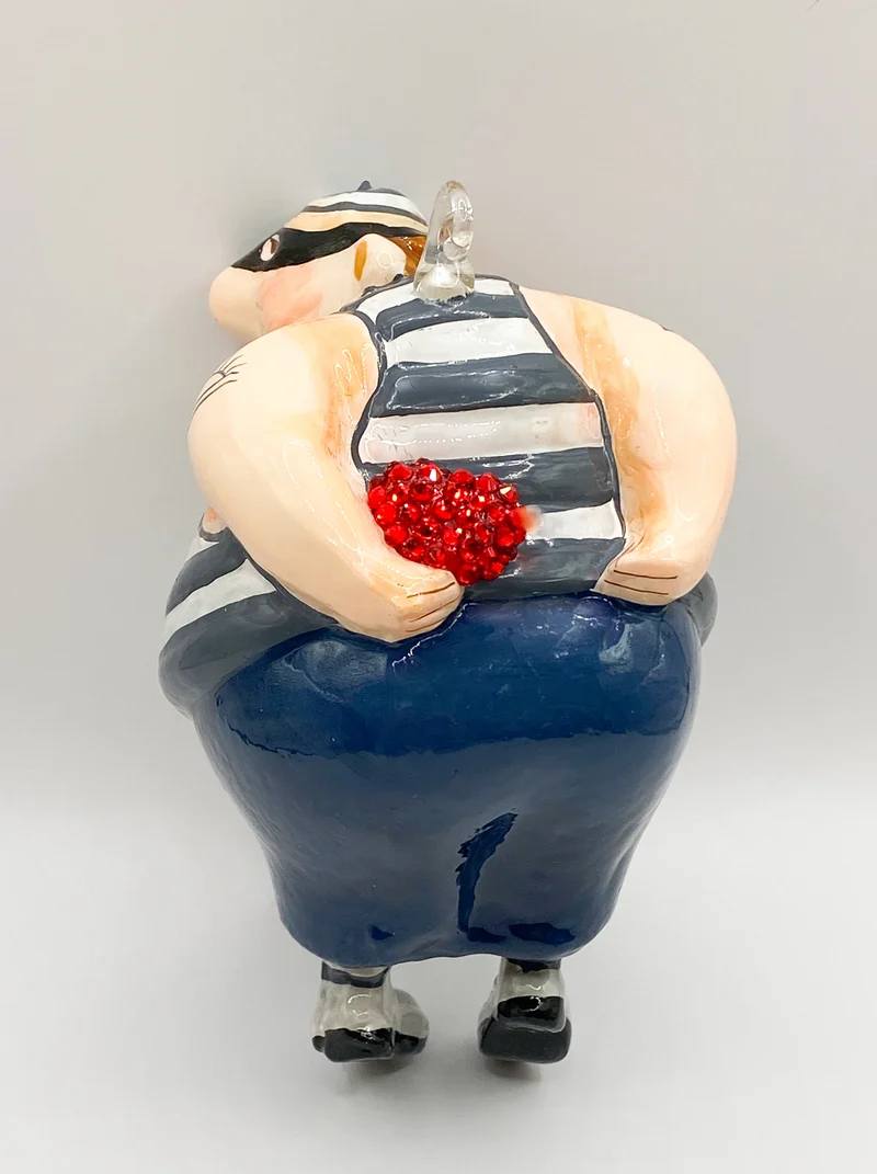 Der nette Dieb Karikatur, KOMOZJA MOSTOWSKI