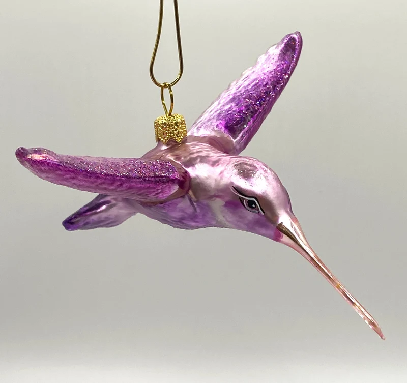 Kolibri pink-rosa Flügel ausgebreitet, Schnabel rosa