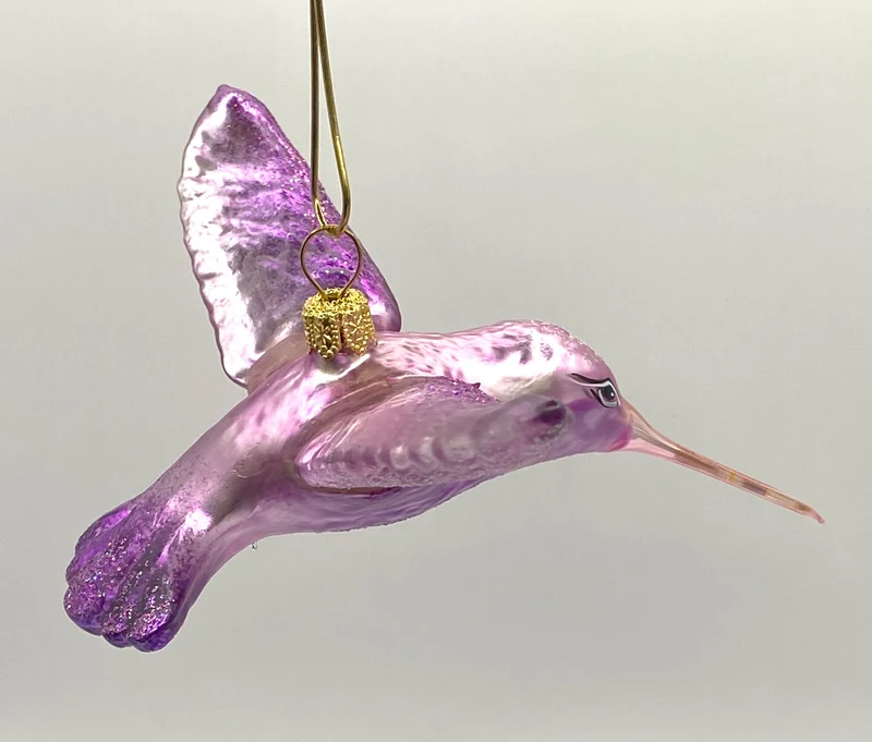 Kolibri pink-rosa Flügel ausgebreitet, Schnabel rosa