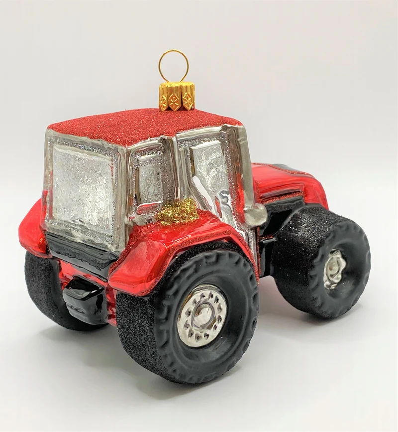 Roter Traktor mit verchromten Rädern